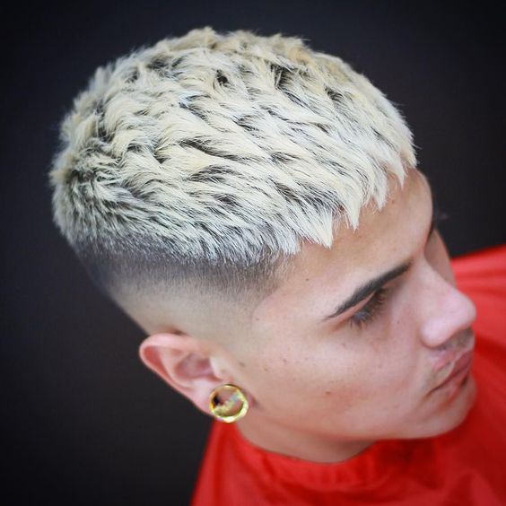 A bleached textured top with a high fade