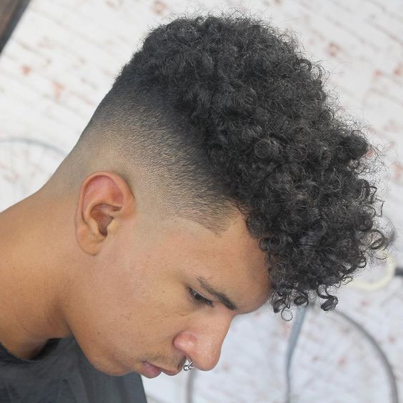 High fade with a curly top
