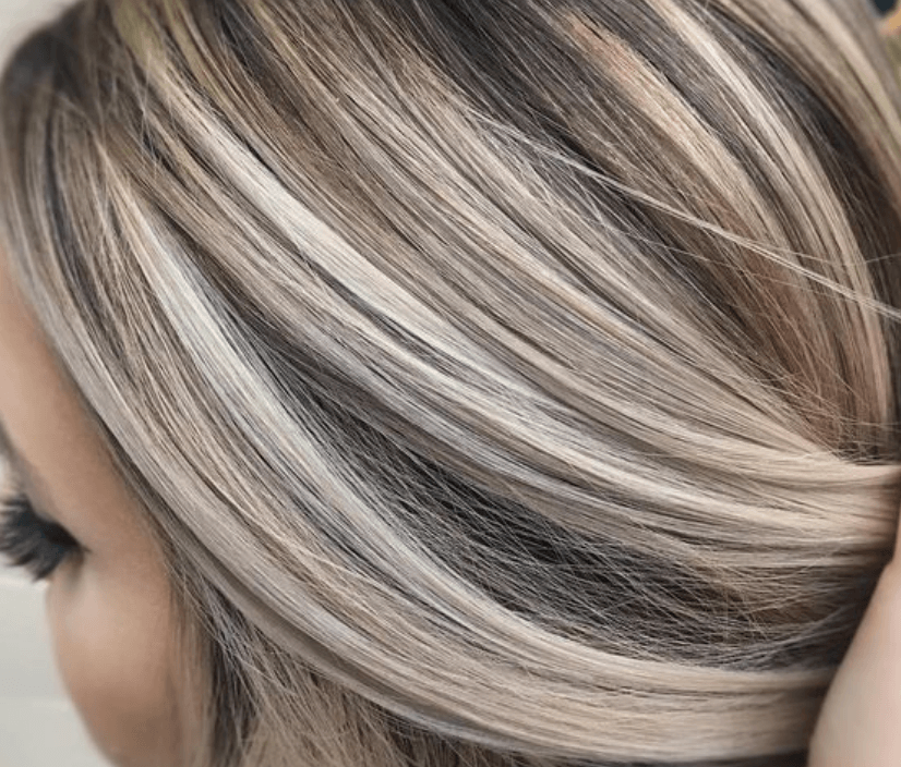 Cool ash blonde against a neutral brown