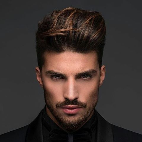 Comb over fade with a modern pompadour