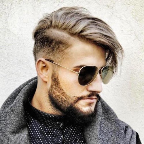 mid fade with side part and long fringe