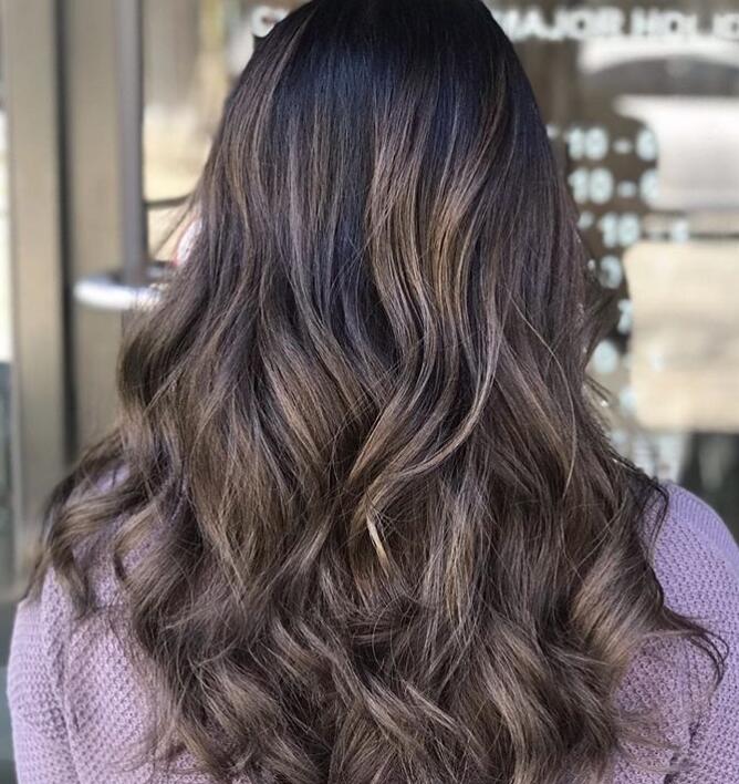 Ash Blonde Streaks in Dark Curls