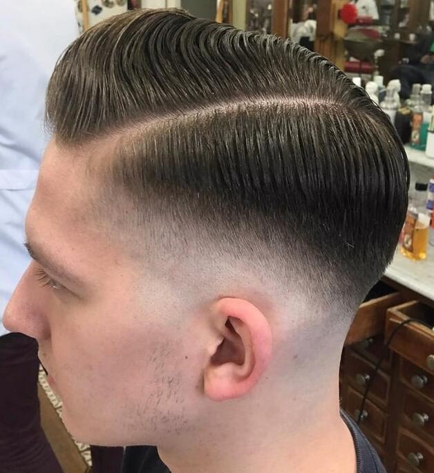 Medium sized pompadour mid fade