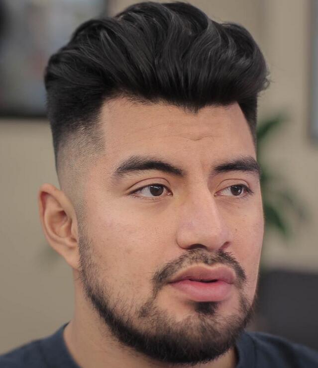 Textured long hair and mid fade