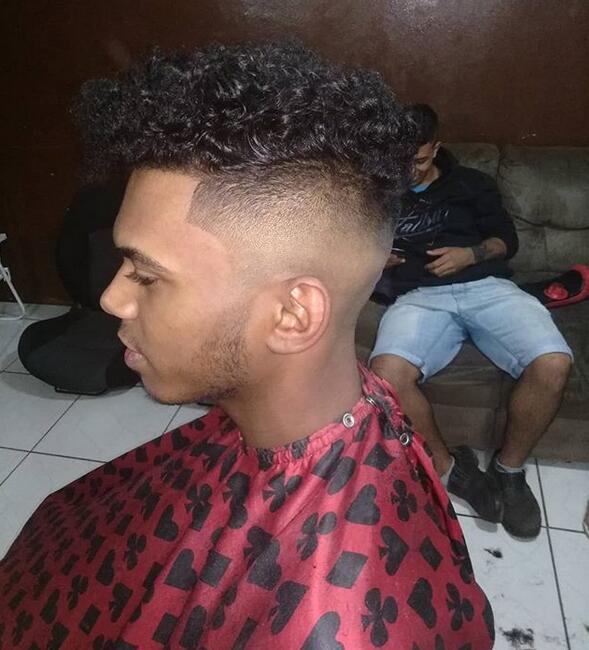 A Burst Fade with a Curly High