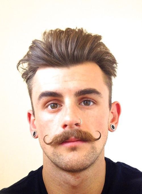 Dapper haircut with a mustache