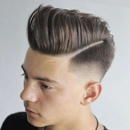 High pompadour fade haircut a side part