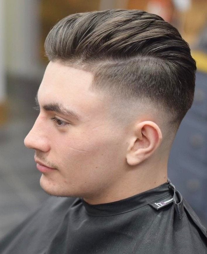 High pompadour fade tapered back