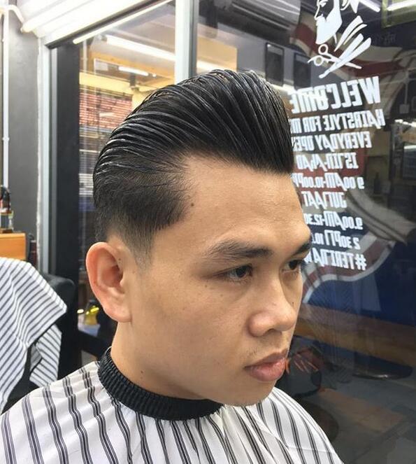 Low classic pompadour fade haircut