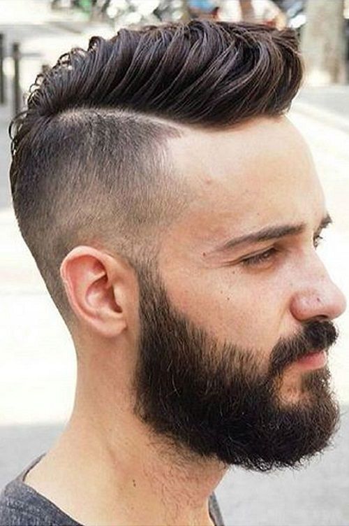 Mid fade pompadour haircut with a line cut