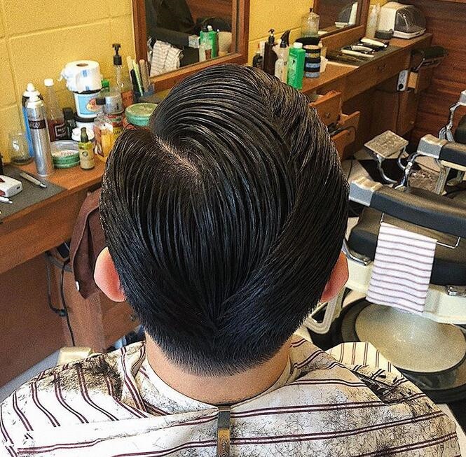 Textured pompadour fade haircut