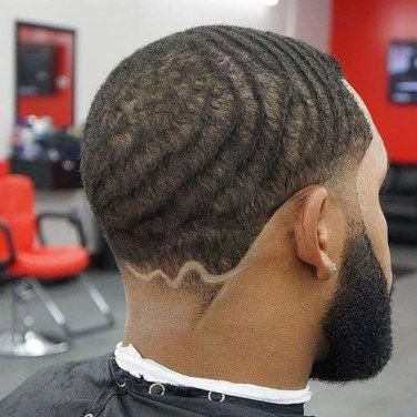 Waves + sideburn + a beard + a creative cut