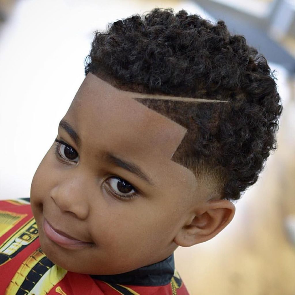 Young black boy with waves hairstyle