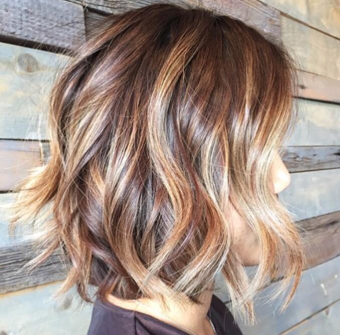 Dark brown bob coupled with a blonde balayage