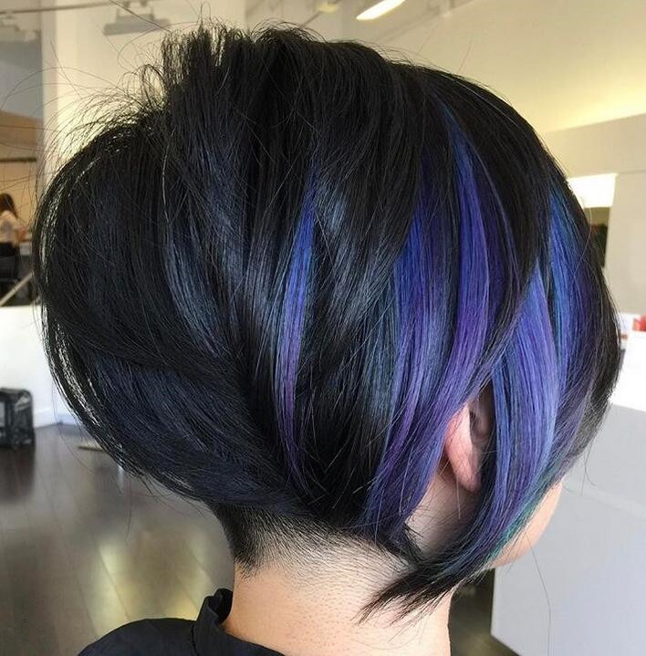 The Undercut Long Pixie Cut coupled with purple highlights