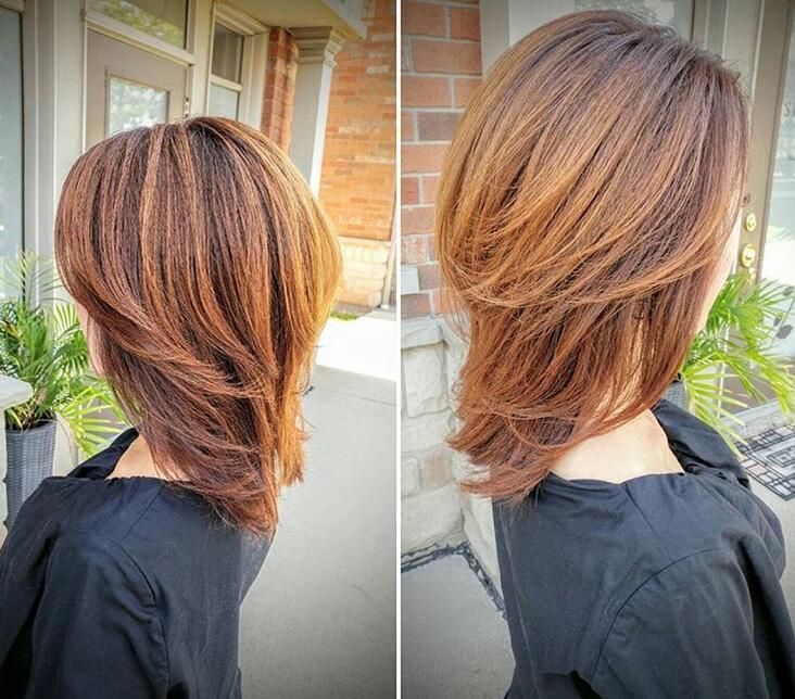 Layered pumpkin spice balayage on straight brown hair