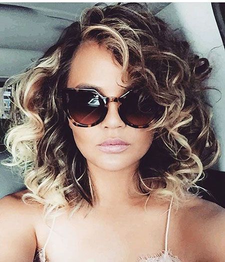Short Curly Hair with Blonde Highlights